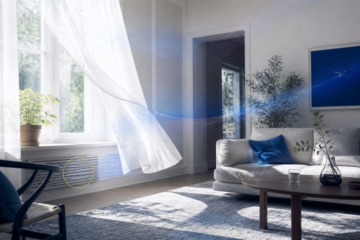 Sunlit living room with visible airflow moving through an open window